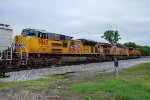 3 units lead a southbound grain train into the siding at McAlester